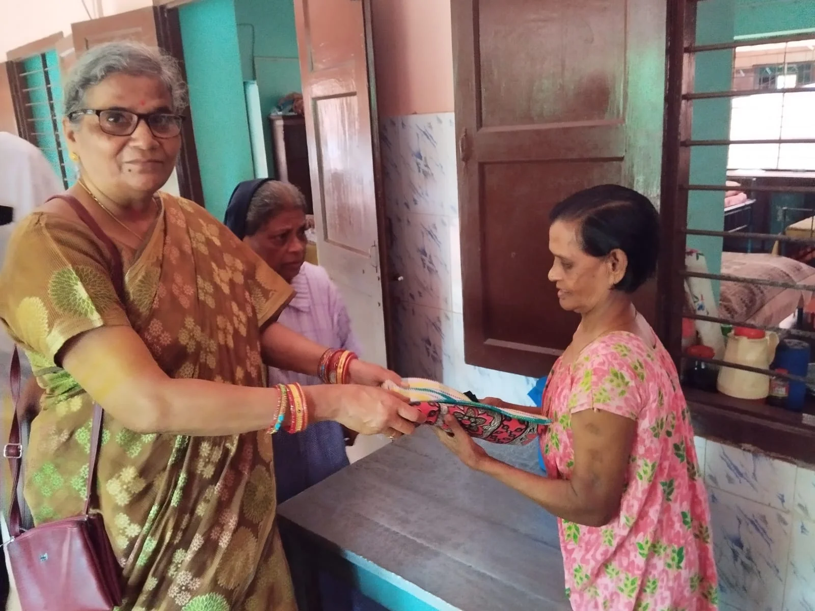 Distribution of Clothes at Daya Old Age Home